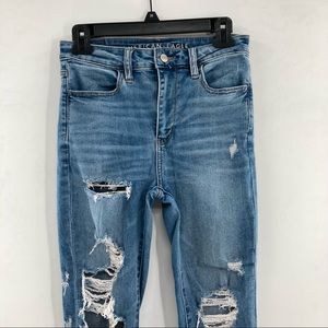 American Eagle next level stretch , Super Hi Rise Jegging, Size 4 reg Distressed